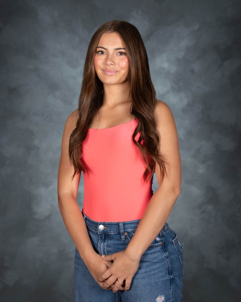 A DLS Innovations high school portrait on a studio background