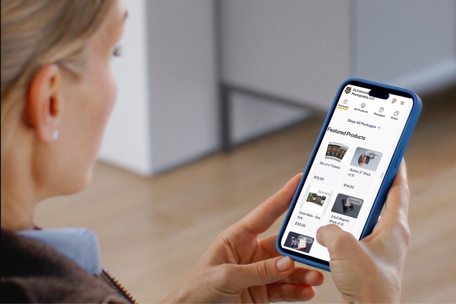 A parent browsing their child's private DLS Innovations photo gallery on a phone